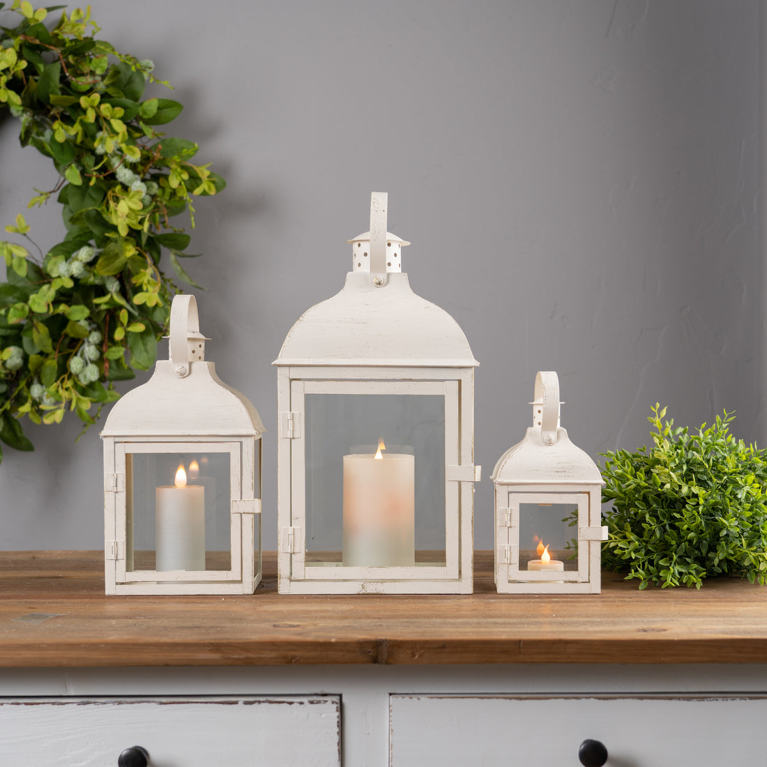 Set of Three Ivory Glass and Metal Floor Lantern Candle Holders