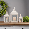 Set of Three Ivory Distressed Glass And Metal Floor Lantern Candle Holders