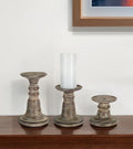 Set of Three Brown Distressed Stone Tabletop Taper Candlesticks