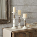 Set of Three Ivory and Natural Resin Tabletop Pillar Candle Holders
