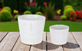 Set of Two White Porcelain 4 Ounce Abstract Face Pot Planters