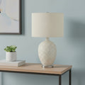 28" White and Silver Ceramic Round Table Lamp With Cream Drum Shade