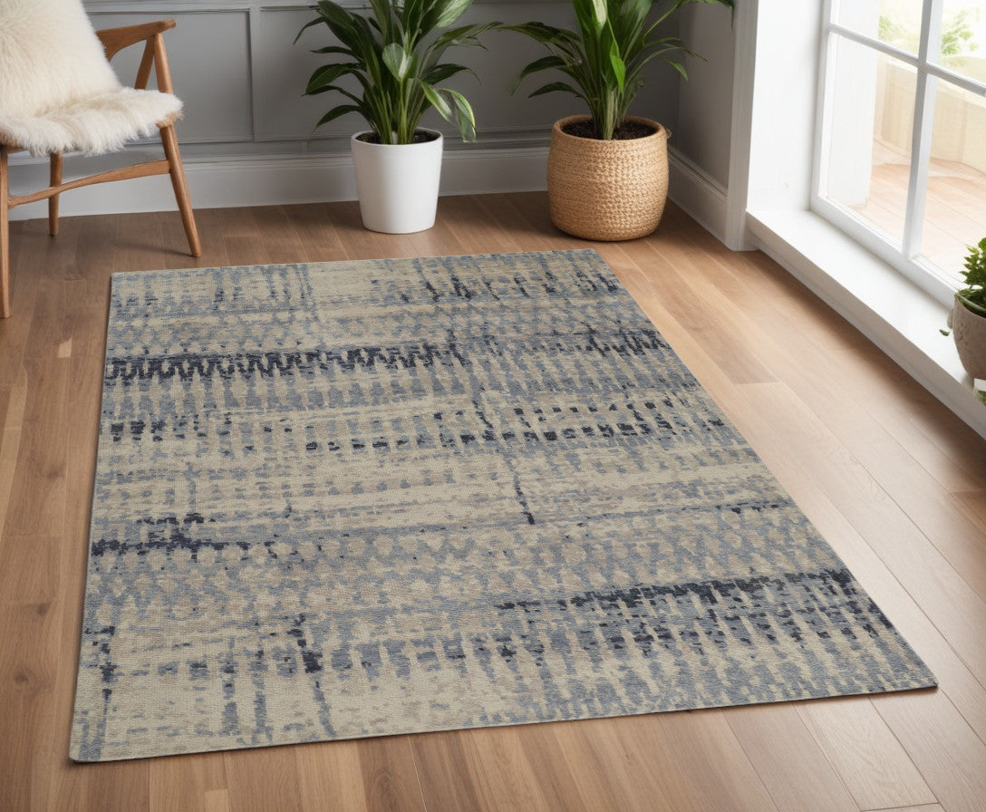 4' X 6' Gray Blue and Ivory Wool Abstract Hand Knotted Area Rug