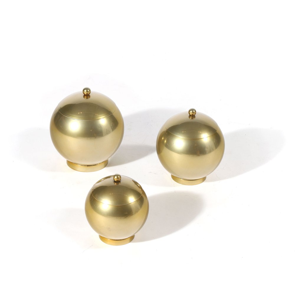 Set of Three Gold Metal Decorative Lidded Canisters