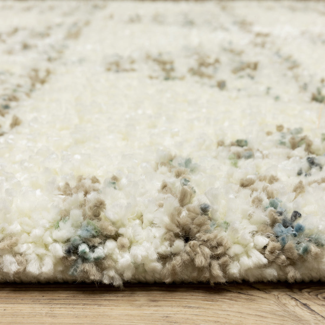 8' X 11' Ivory And Green Geometric Shag Area Rug With Fringe