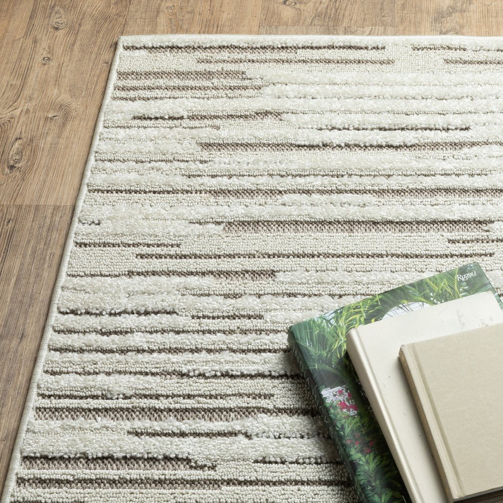 5' X 8' Ivory And Brown Striped Distressed Area Rug