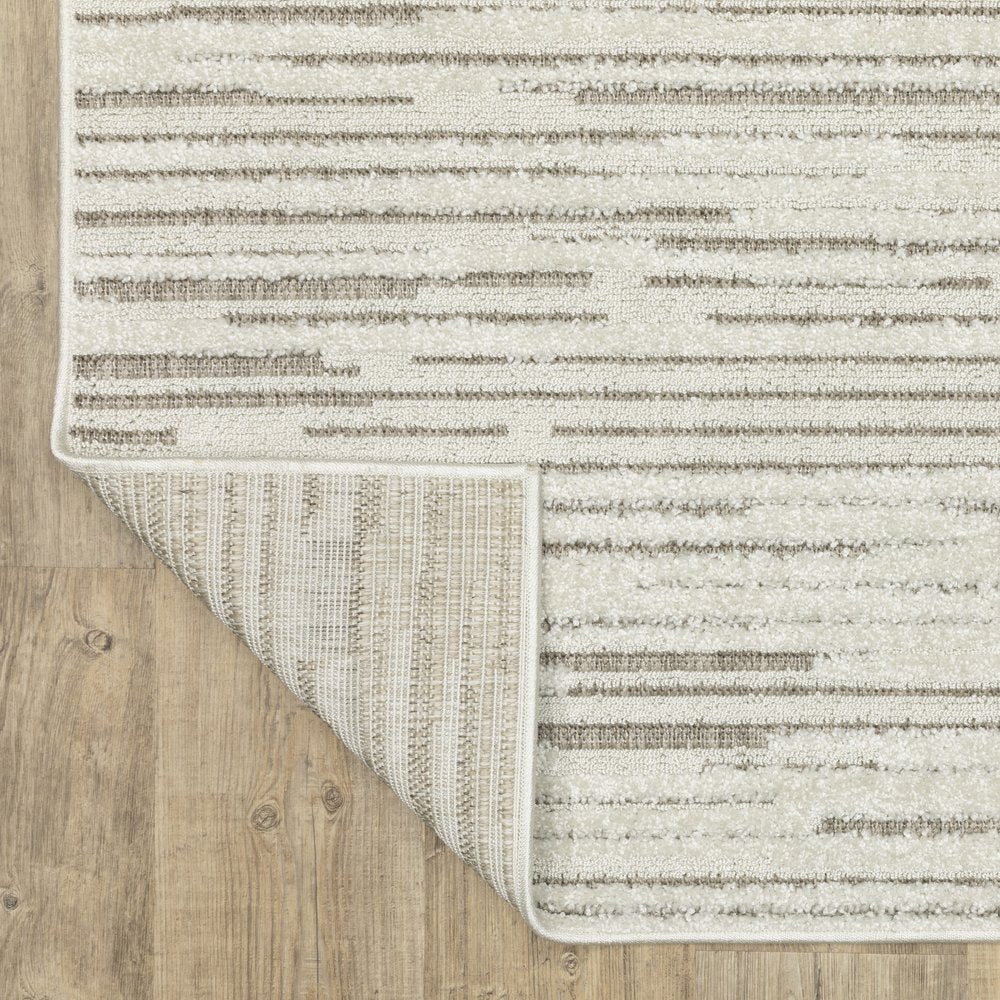 5' X 8' Ivory And Brown Striped Distressed Area Rug