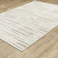 5' X 8' Ivory And Brown Striped Distressed Area Rug