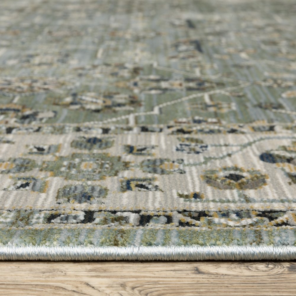 8' X 11' Blue And Green Floral Area Rug With Fringe