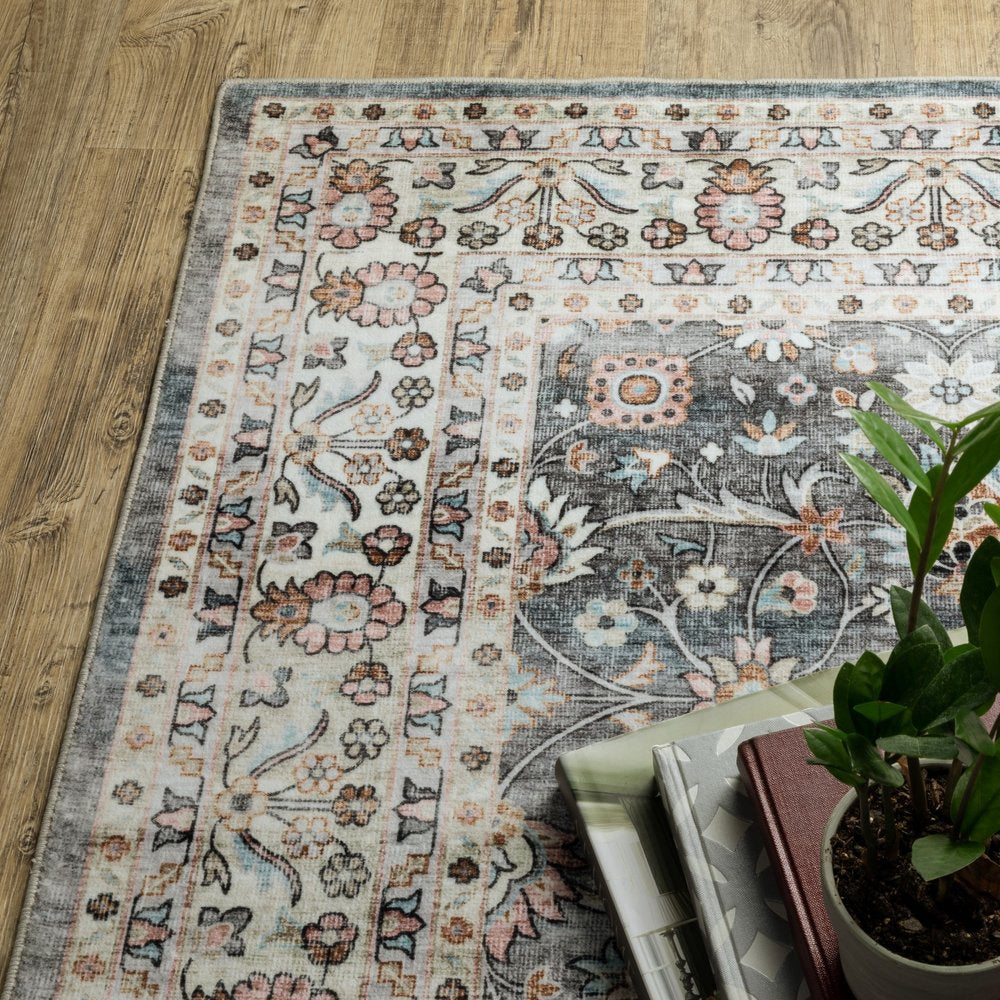 5' X 7' Gray And Ivory Oriental Area Rug